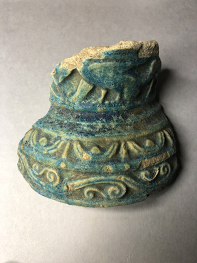 <em>Vessel Fragment</em>, 305 B.C.E.-395 C.E. Faience, 3 13/16 x 4 5/16 in. (9.7 x 11 cm). Brooklyn Museum, Anonymous gift, 69.112.23. Creative Commons-BY (Photo: , CUR.69.112.23_view01.jpg)