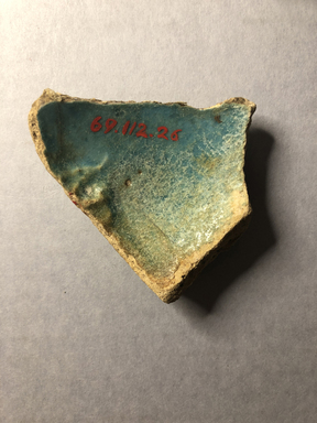  <em>Vessel Fragment</em>, 305 B.C.E.–395 C.E. Faience, 2 11/16 x 2 15/16 in. (6.8 x 7.5 cm). Brooklyn Museum, Anonymous gift, 69.112.26. Creative Commons-BY (Photo: , CUR.69.112.26_view02.jpg)