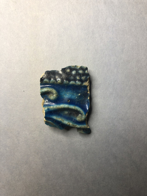 <em>Vessel Fragment</em>, 305 B.C.E.–395 C.E. Faience, 1 1/4 x 1 3/4 x 1/4 in. (3.2 x 4.5 x 0.6 cm). Brooklyn Museum, Anonymous gift, 69.112.3. Creative Commons-BY (Photo: , CUR.69.112.3_view01.jpg)