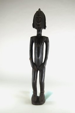 Dogon. <em>Figure of a Standing Female</em>, late 19th or early 20th century. Wood, 22in. (55.9cm). Brooklyn Museum, Robert B. Woodward Memorial Fund and Gift of Arturo and Paul Peralta-Ramos, by exchange, 69.39.1. Creative Commons-BY (Photo: Brooklyn Museum, CUR.69.39.1_front_PS5.jpg)