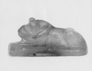  <em>Amulet in Shape of Recumbent Lion</em>. Carnelian, 3/16 x 1/2 in. (0.5 x 1.2 cm). Brooklyn Museum, Gift of Jeannette Brun, 69.71.2. Creative Commons-BY (Photo: Brooklyn Museum, CUR.69.71.2_NegB_print_bw.jpg)