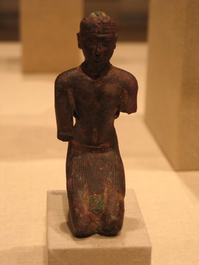 Egyptian. <em>Statuette of a Kushite King</em>, ca. 712-653 B.C.E. Bronze, gold leaf, 4 7/16 x 1 7/8 x 1 7/8 in. (11.2 x 4.7 x 4.8 cm). Brooklyn Museum, Charles Edwin Wilbour Fund, 69.73. Creative Commons-BY (Photo: Brooklyn Museum, CUR.69.73_wwg8.jpg)