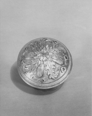 Parthian. <em>Round Boss Partially Gilt</em>, 2nd-1st century B.C.E. Silver, gold, 15/16 x 3 7/16 in. (2.4 x 8.7 cm). Brooklyn Museum, Gift of Mr. and Mrs. Alastair Bradley Martin, 70.142.13. Creative Commons-BY (Photo: Brooklyn Museum, CUR.70.142.13_NegA_print_bw.jpg)