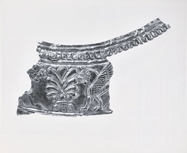 Persian. <em>Fragment of Overlay, 1 of 5</em>, 8th-7th century B.C.E. Gold, 1 1/4 x 2 11/16 in. (3.2 x 6.9 cm). Brooklyn Museum, Gift of Mr. and Mrs. Alastair Bradley Martin, 70.142.3. Creative Commons-BY (Photo: Brooklyn Museum, CUR.70.142.3a_print_bw.jpg)
