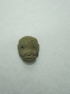  <em>Pendant</em>. Jade Brooklyn Museum, Gift of Jerome Furman, 70.151.12. Creative Commons-BY (Photo: Brooklyn Museum, CUR.70.151.12_view1.jpg)