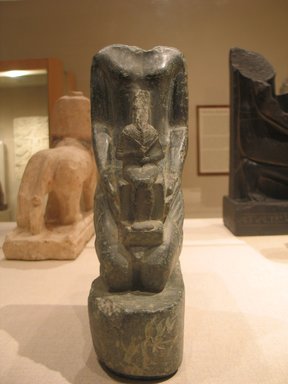  <em>Statue of a Man</em>, 664 B.C.E. or later. Stone, 11 15/16 x 3 9/16 x 7 1/16 in. (30.4 x 9 x 18 cm). Brooklyn Museum, Gift of George London
, 70.88. Creative Commons-BY (Photo: Brooklyn Museum, CUR.70.88_wwgA-2.jpg)