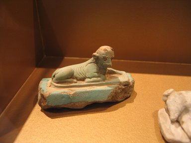  <em>Recumbent Calf</em>, ca. 1938-1700 B.C.E. or ca. 664-505 B.C.E. Faience, 1 11/16 x 3 1/16 x 1 1/4 in. (4.3 x 7.7 x 3.1 cm). Brooklyn Museum, Charles Edwin Wilbour Fund, 70.92. Creative Commons-BY (Photo: Brooklyn Museum, CUR.70.92_erg2.jpg)