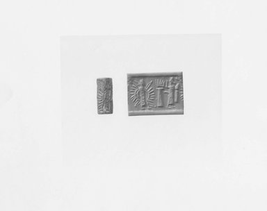 Ancient Near Eastern. <em>Cylinder Seal</em>, 9th century B.C.E. Breccia, 1 x Diam. 7/16 in. (2.6 x 1.1 cm). Brooklyn Museum, Twentieth-Century Fox Fund, 71.115.11. Creative Commons-BY (Photo: Brooklyn Museum, CUR.71.115.11_NegA_print_bw.jpg)