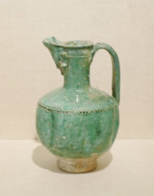  <em>Ewer</em>, 11th-12th century. Ceramic; earthenware, with an opaque green glaze, 7 1/4 x 5 in. (18.4 x 12.7 cm). Brooklyn Museum, Special Middle Eastern Art Fund, 71.15. Creative Commons-BY (Photo: Brooklyn Museum, CUR.71.15.jpg)