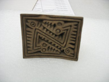  <em>Stamp</em>, 1000-1500. Ceramic, 2 1/8 x 2 x 2 5/8 in. (5.4 x 5.1 x 6.7 cm). Brooklyn Museum, Gift of Ernest E. Erickson, 71.174.14. Creative Commons-BY (Photo: Brooklyn Museum, CUR.71.174.14_view2.jpg)