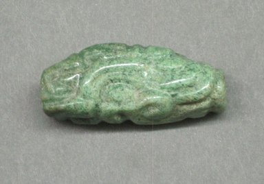 Maya. <em>Tubular Bead</em>. Jadeite, 13/16 x 1/2 x 2 in. (2.1 x 1.3 x 5.1 cm). Brooklyn Museum, Gift of Ernest E. Erickson, 71.174.6. Creative Commons-BY (Photo: Brooklyn Museum, CUR.71.174.6.jpg)