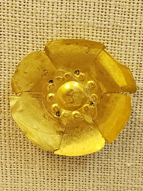 Greek. <em>Six - Petalled Rosette Punched with Four Holes</em>, late 4th century B.C.E. Gold, 3/16 x 15/16 in. (0.4 x 2.4 cm). Brooklyn Museum, Gift of Mr. and Mrs. Thomas S. Brush, 71.79.112. Creative Commons-BY (Photo: Brooklyn Museum, CUR.71.79.112_overall01.jpg)