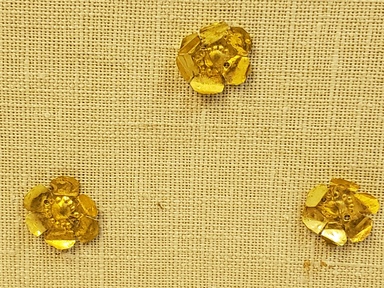 Greek. <em>Rosette with Six Petals</em>, late 4th century B.C.E. Gold, 1/16 x 1 9/16 in. (0.2 x 4 cm). Brooklyn Museum, Gift of Mr. and Mrs. Thomas S. Brush, 71.79.113. Creative Commons-BY (Photo: Brooklyn Museum, CUR.71.79.113-.115_overall.jpg)