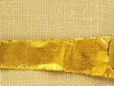 Greek. <em>Diadem of the Pediment Type: Left End</em>, late 4th century B.C.E. Gold, 7/8 x 3 1/4 in. (2.3 x 8.3 cm). Brooklyn Museum, Gift of Mr. and Mrs. Thomas S. Brush, 71.79.117a. Creative Commons-BY (Photo: Brooklyn Museum, CUR.71.79.117a-b_overall01.jpg)