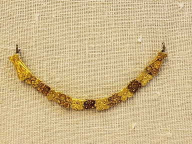 Greek. <em>Bead</em>, late 4th century B.C.E. Gold, 1/8 x 1/4 x 1/2 in. (0.3 x 0.7 x 1.2 cm). Brooklyn Museum, Gift of Mr. and Mrs. Thomas S. Brush, 71.79.38. Creative Commons-BY (Photo: Brooklyn Museum, CUR.71.79.27_-.39_overall.jpg)