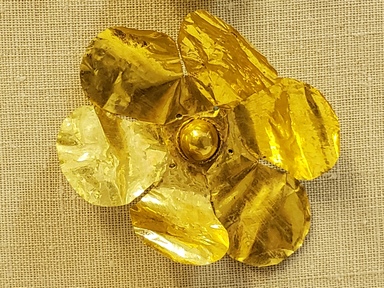 Greek. <em>Large Rosette Bead</em>, late 4th century B.C.E. Gold, 2 5/8 in. (6.6 cm). Brooklyn Museum, Gift of Mr. and Mrs. Thomas S. Brush, 71.79.96. Creative Commons-BY (Photo: Brooklyn Museum, CUR.71.79.96_overall01.jpg)