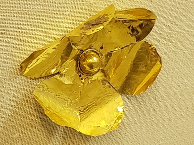 Greek. <em>Large Rosette Bead</em>, late 4th century B.C.E. Gold, 2 7/16 in. (6.2 cm). Brooklyn Museum, Gift of Mr. and Mrs. Thomas S. Brush, 71.79.97. Creative Commons-BY (Photo: Brooklyn Museum, CUR.71.79.97_overall01.jpg)