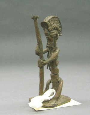 Yorùbá. <em>Seated Female Figure</em>, late 19th or early 20th century. Copper alloy, h: 4 1/2 in. Brooklyn Museum, Gift of David R. Markin, 72.49.3. Creative Commons-BY (Photo: Brooklyn Museum, CUR.72.49.3.jpg)