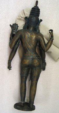  <em>Four-Armed Standing Padmapani</em>, 19th - 20th century. Bronze, inlaid with copper and silver., H: 20 1/4 x 8 1/4 x 4 in. (51.5 x 21 x 10.2 cm). Brooklyn Museum, Gift of Mr. and Mrs. Jack Zimmerman, 72.93. Creative Commons-BY (Photo: Brooklyn Museum, CUR.72.93_back.jpg)