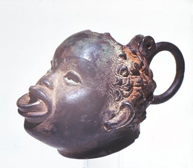  <em>Lamp</em>. Bronze, 2 15/16 x 3 x 4 15/16 in. (7.4 x 7.6 x 12.5 cm). Brooklyn Museum, Charles Edwin Wilbour Fund, 74.43. Creative Commons-BY (Photo: Brooklyn Museum, CUR.74.43.jpg)