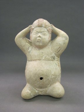 Olmec. <em>Seated Figure with Arms Raised to Head</em>, 1200-300 B.C.E. Ceramic, white-slipped, red pigment, 12 x 8 1/2 in. (30.5 x 21.6 cm). Brooklyn Museum, Caroline A.L. Pratt Fund, 75.40. Creative Commons-BY (Photo: Brooklyn Museum, CUR.75.40_view1.jpg)
