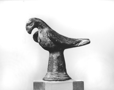  <em>A Standing Falcon with Folded Wings</em>. Bronze, 1 5/8 x 2 in. (4.2 x 5 cm). Brooklyn Museum, Gift of Dr. and Mrs. Leonard Gorelick, 75.4. Creative Commons-BY (Photo: Brooklyn Museum, CUR.75.4_NegA_print_bw.jpg)