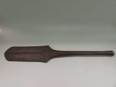 Tongan. <em>Paddle Shaped Staff</em>, late 19th-early 20th century. Wood, length: 38 in. (96.5 cm). Brooklyn Museum, Purchased with funds given by The Evelyn A. Jaffe Hall Charitable Trust, 76.1.13. Creative Commons-BY (Photo: Brooklyn Museum, CUR.76.1.13_overall.jpg)