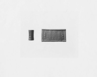 Ancient Near Eastern. <em>Cylinder Seal</em>, 1900-1750 B.C.E. Hematite, 13/16 x Diam. 7/16 in. (2.1 x 1.1 cm). Brooklyn Museum, Special Middle Eastern Art Fund, 76.109.1. Creative Commons-BY (Photo: Brooklyn Museum, CUR.76.109.1_NegA_print_bw.jpg)
