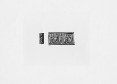Ancient Near Eastern. <em>Cylinder Seal</em>, 1850-1700 B.C.E. Hematite, 3/4 x Diam. 5/16 in. (1.9 x 0.9 cm). Brooklyn Museum, Special Middle Eastern Art Fund, 76.109.2. Creative Commons-BY (Photo: Brooklyn Museum, CUR.76.109.2_NegA_print_bw.jpg)