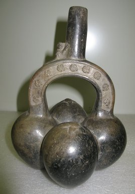 Chimú. <em>Stirrup Spout Vessel in Form of Four Gourds</em>, ca.1100-1400. Ceramic, 8 1/2 x 6 1/2 x 6 1/4 in. (21.6 x 16.5 x 15.9 cm). Brooklyn Museum, Gift of Egizia Modiano, 76.166.25. Creative Commons-BY (Photo: Brooklyn Museum, CUR.76.166.25.jpg)
