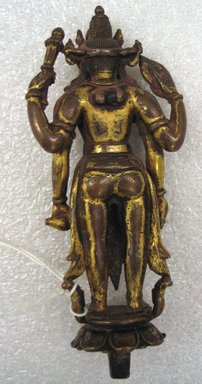  <em>Figure of Standing Vishnu</em>, 13th century. Gilt copper, 5 1/2 x 2 3/8 x 1 in. (14 x 6.1 x 2.5 cm). Brooklyn Museum, Anonymous gift, 77.257.1. Creative Commons-BY (Photo: Brooklyn Museum, CUR.77.257.1_back.jpg)