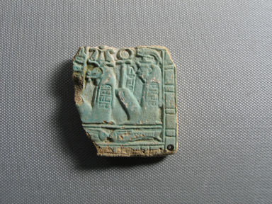  <em>Fragment of Pectoral</em>, ca. 1085-712 B.C.E. Faience, 2 1/8 × 2 1/16 × 1/2 in. (5.4 × 5.2 × 1.2 cm). Brooklyn Museum, Gift of Roger Khawam, 77.5. Creative Commons-BY (Photo: , CUR.77.5_view01.jpg)