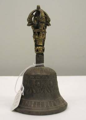  <em>Bell</em>, 18th century. Bronze with brass handle, 7 x 3 5/8 in. (17.8 x 9.2 cm). Brooklyn Museum, Designated Purchase Fund, 77.9.2. Creative Commons-BY (Photo: Brooklyn Museum, CUR.77.9.2_back.jpg)