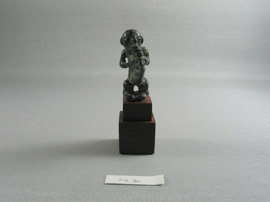 Greek. <em>Seated Figure of a Lyre Player</em>, 7th century B.C.E. Bronze, 1 13/16 x 3/4 x 1 1/4 in. (4.6 x 1.9 x 3.1 cm). Brooklyn Museum, Gift of William W. Brill and Dorothy Robbins, 79.30. Creative Commons-BY (Photo: Brooklyn Museum, CUR.79.30_view01.jpg)