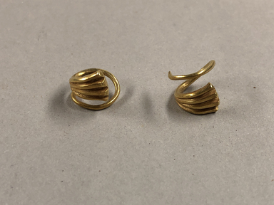 Anatolian. <em>Pair of Earrings</em>, ca. 2500-2000 B.C.E. Gold, Diameter: 9/16 in. (1.5 cm). Brooklyn Museum, Special Middle Eastern Art Fund, 79.33a-b. Creative Commons-BY (Photo: , CUR.79.33a-b_view01.jpg)