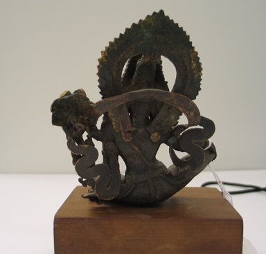  <em>Seated Indra</em>, 17th century or earlier. Gilt bronze, 5 5/16 x 4 7/16 x 2 1/4 in. (13.5 x 11.3 x 5.7 cm). Brooklyn Museum, Gift of Mr. and Mrs. Edward Greenberg, 80.260.1. Creative Commons-BY (Photo: Brooklyn Museum, CUR.80.260.1_back.jpg)
