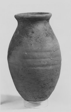  <em>Ovoid Jar</em>. Clay, 9 3/8 x Greatest Diam. 5 1/4 in. (23.8 x 13.4 cm). Brooklyn Museum, Gift of the Egyptian Antiquities Organization, 80.7.10. Creative Commons-BY (Photo: Brooklyn Museum, CUR.80.7.10_NegA_print_bw.jpg)