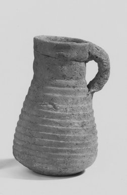  <em>Juglet</em>. Clay, slip, 3 5/8 in. (9.2 cm). Brooklyn Museum, Gift of the Egyptian Antiquities Organization, 80.7.12. Creative Commons-BY (Photo: Brooklyn Museum, CUR.80.7.12_NegA_print_bw.jpg)