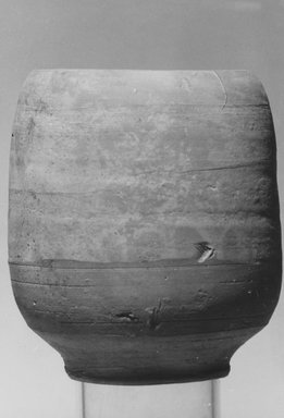  <em>Open Form Lamp</em>. Clay, 4 15/16 x 3 9/16 in. (12.5 x 9 cm). Brooklyn Museum, Gift of the Egyptian Antiquities Organization, 80.7.13. Creative Commons-BY (Photo: Brooklyn Museum, CUR.80.7.13_NegL879_2_print_bw.jpg)