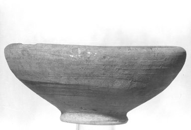  <em>Conical Bowl</em>, 305–30 B.C.E. Clay, 2 3/4 x 6 3/16 in. (7 x 15.7 cm). Brooklyn Museum, Gift of the Egyptian Antiquities Organization, 80.7.27. Creative Commons-BY (Photo: Brooklyn Museum, CUR.80.7.27_NegL889_3A_print_bw.jpg)