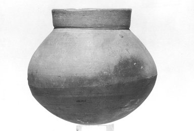  <em>Biconical Vessel with Offset Rim</em>. Clay, 3 9/16 x 2 9/16 in. (9 x 6.5 cm). Brooklyn Museum, Gift of the Egyptian Antiquities Organization, 80.7.28. Creative Commons-BY (Photo: Brooklyn Museum, CUR.80.7.28_NegL889_5A_print_bw.jpg)