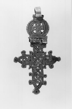 Amhara. <em>Neck Cross</em>. Silver, 2 3/4 x 1 1/2 in. (7 x 3.8 cm). Brooklyn Museum, Gift of Mrs. William R. Maris, 81.45.6. Creative Commons-BY (Photo: Brooklyn Museum, CUR.81.45.6_print_bw.jpg)