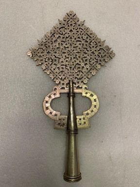 Amhara artist. <em>Processional Cross (qäqwami mäsqäl)</em>, 20th century. Silver, 15 x 8 1/8 in. (38.2 x 20.7 cm). Brooklyn Museum, Gift of George V. Corinaldi Jr., 82.102.2. Creative Commons-BY (Photo: , CUR.82.102.2_front.jpg)