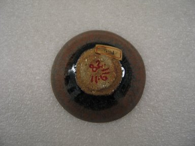 Kimura Morikazu (Japanese, born 1934). <em>Sake Cup</em>, ca. 1965. Stoneware; Temmoku ware, 1 3/8 x 3 3/8 in. (3.5 x 8.6 cm). Brooklyn Museum, Gift of Martin Greenfield, 82.119.11. Creative Commons-BY (Photo: Brooklyn Museum, CUR.82.119.11_bottom.jpg)
