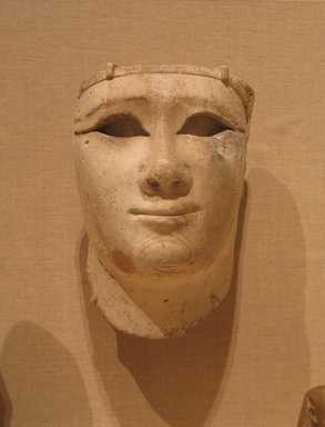  <em>Head of a King or Deity</em>, 4th century B.C.E. Plaster, 9 1/16 x 5 1/2 x 5 1/8 in. (23 x 14 x 13 cm). Brooklyn Museum, Charles Edwin Wilbour Fund, 82.22. Creative Commons-BY (Photo: Brooklyn Museum, CUR.82.22_wwg8.jpg)