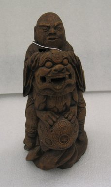  <em>Daoist Immortal Riding a Lion-Dog</em>, 19th century. Bamboo-root, 9 3/4 x 5 in. (24.8 x 12.7 cm). Brooklyn Museum, Gift of Robert S. Anderson, 83.176.2. Creative Commons-BY (Photo: Brooklyn Museum, CUR.83.176.2_view1.jpg)