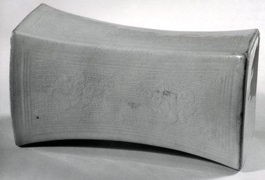  <em>Ding Ware Pillow</em>, 11th-12th century. Ivory white stoneware, 4 1/4 x 5 x 9 1/4 in. (10.8 x 12.7 x 23.5 cm). Brooklyn Museum, Gift of Mr. and Mrs. Donald Farm, 84.135.1. Creative Commons-BY (Photo: Brooklyn Museum, CUR.84.135.1_bw.jpg)