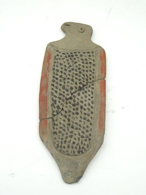 Tumaco. <em>Fish-Shaped Grater</em>, 300 B.C.E.-300 C.E. Clay, stone, slip, 7 3/4 x 3/4 in.  (19.7 x 1.9 cm). Brooklyn Museum, Gift of Mr. and Mrs. Tessim Zorach, 84.56. Creative Commons-BY (Photo: Brooklyn Museum, CUR.84.56_front.jpg)