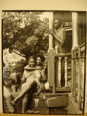 Nakamura Nobuo (Japanese, born 1946). <em>Mother and Daughter with Friend (50 West 130th Street)</em>, 1983. Gelatin silver print, 10 × 8 in. (25.4 × 20.3 cm). Brooklyn Museum, Gift of the artist, 84.95.5. © artist or artist's estate (Photo: Brooklyn Museum, CUR.84.95.5.jpg)