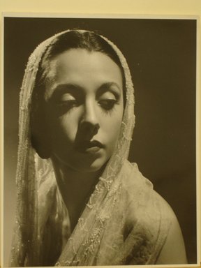 Philippe Halsman (American, born Latvia, 1906-1979). <em>[Untitled]  (Brunette Woman Looking to Right Wearing White Lace Shawl on Head)</em>, 1944. Gelatin silver photograph Brooklyn Museum, Gift of Dr. and Mrs. Arthur E. Kahn, 85.294.25. © artist or artist's estate (Photo: Brooklyn Museum, CUR.85.294.25.jpg)